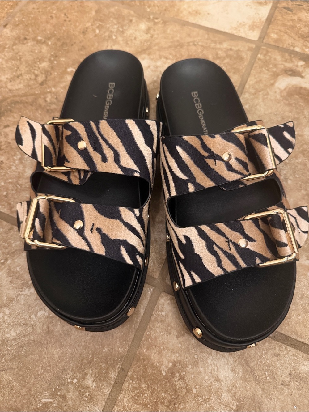 BCBGeneration Zebra-Print Double Buckle Slide Sandals in Black and Tan